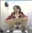 A Japanese voyeur, bowlcam video clip with full audio features a dressed-up girl shitting into a floor toilet. About 5 minutes.